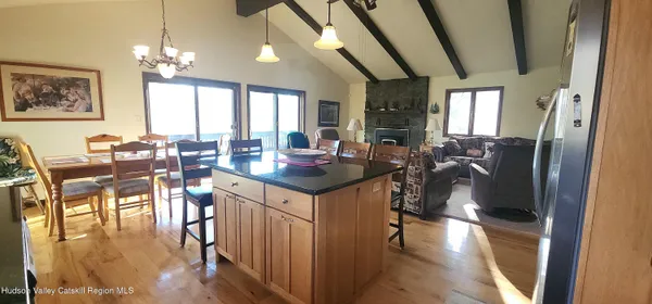 a view of a dining room with furniture window and outside view