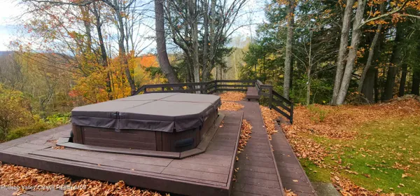 a view of a wooden floor with a yard