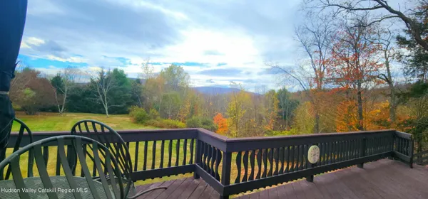 a view of a balcony with lake view