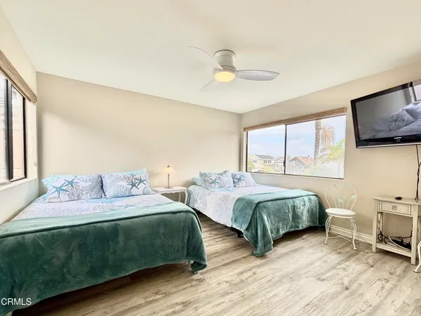 a view of a balcony with furniture