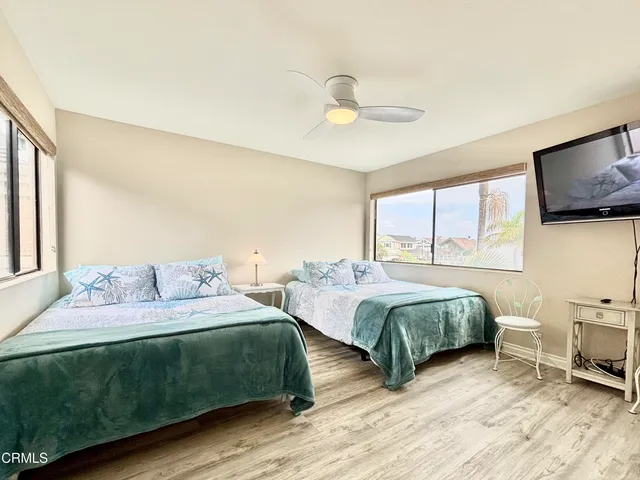 a view of a balcony with furniture