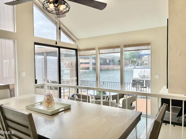 a view of living room and kitchen with furniture