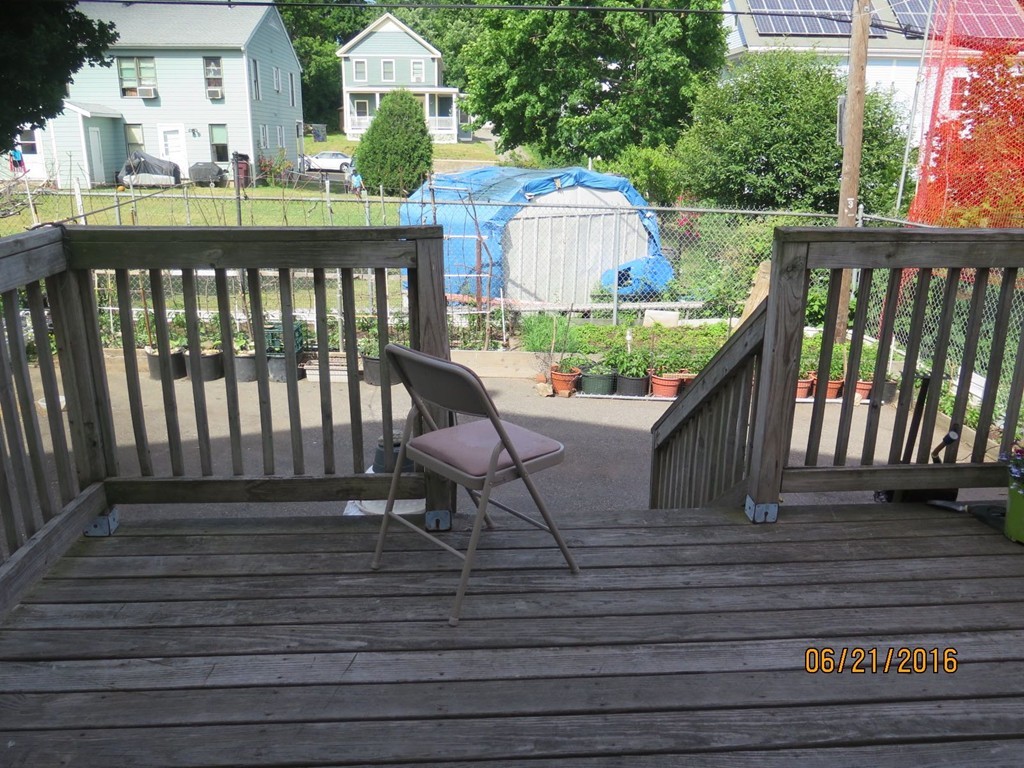 11-13 Gardner Street Worcester, MA 01610 - Photo 14 of 20 a view of a two chairs in the balcony