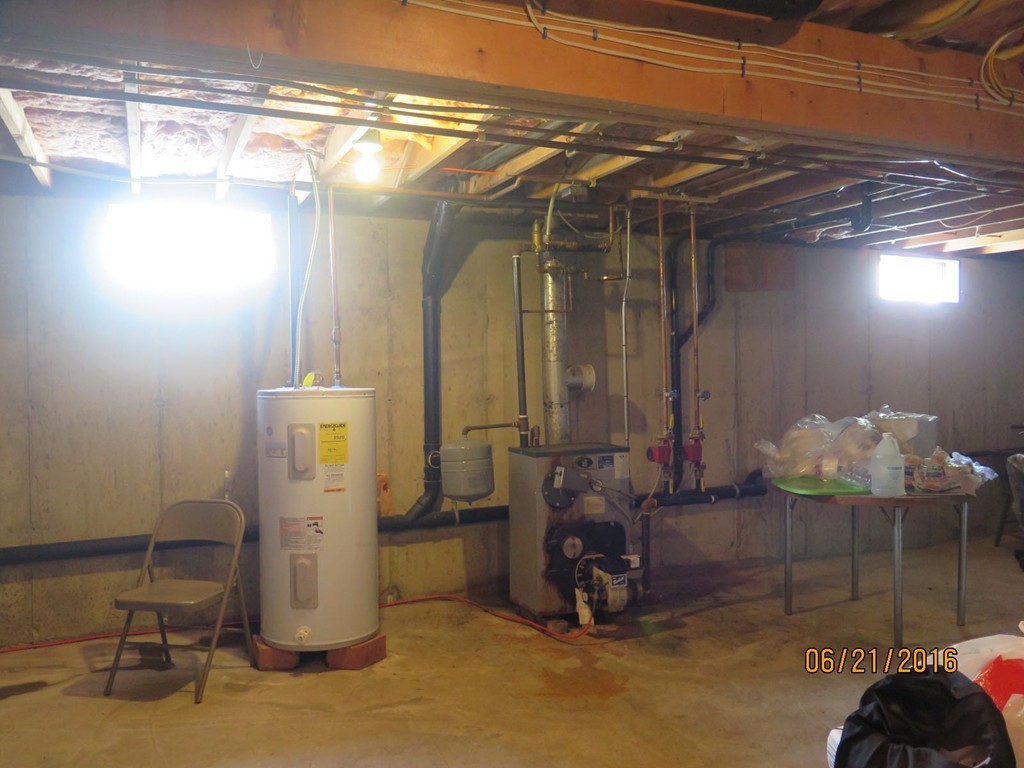 11-13 Gardner Street Worcester, MA 01610 - Photo 7 of 20 a view of a room with gym equipment