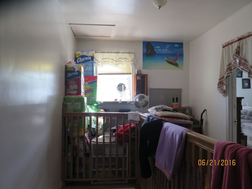 11-13 Gardner Street Worcester, MA 01610 - Photo 10 of 20 a view of a hallway with workspace