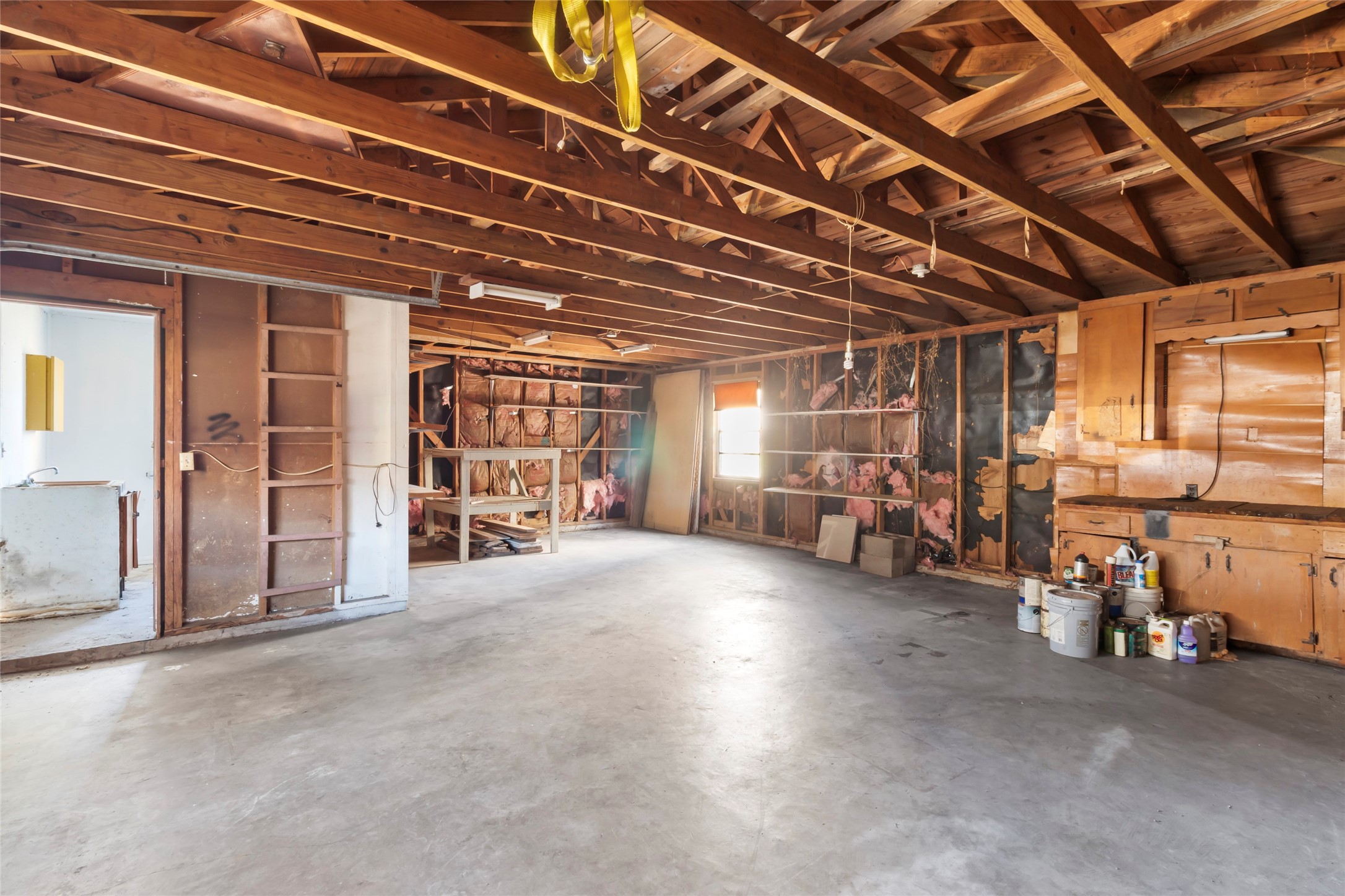 1427 West 22nd Street Houston, TX 77008 - Photo 16 of 23 a view of a empty room with storage and utility room