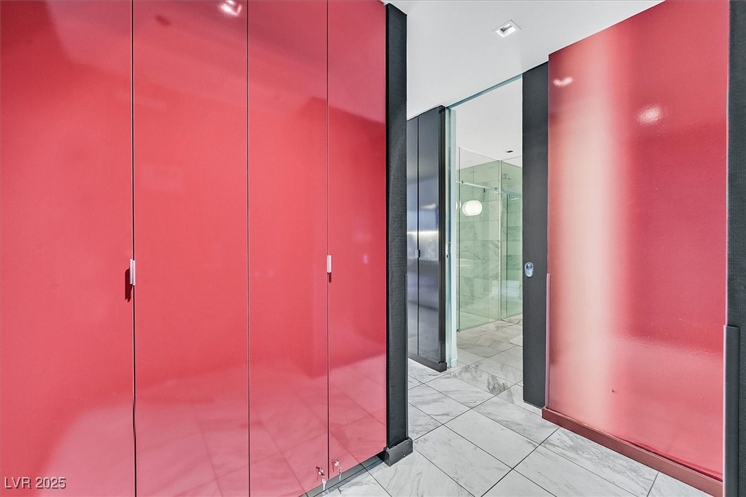 4381 West Flamingo Road, Unit 1609 Las Vegas, NV 89103 - Photo 20 of 27 Corridor featuring marble finish floor