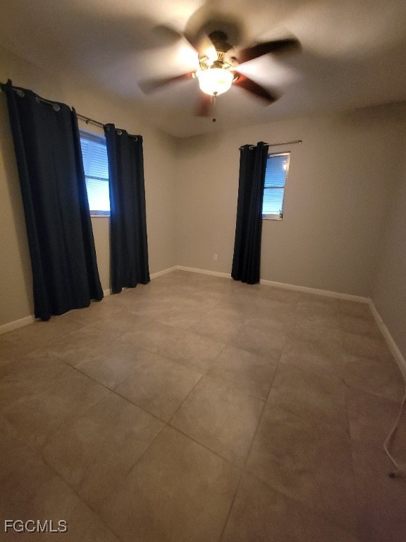 341 Richland Road Lehigh Acres, FL 33936 - Photo 13 of 16 a view of empty room with window