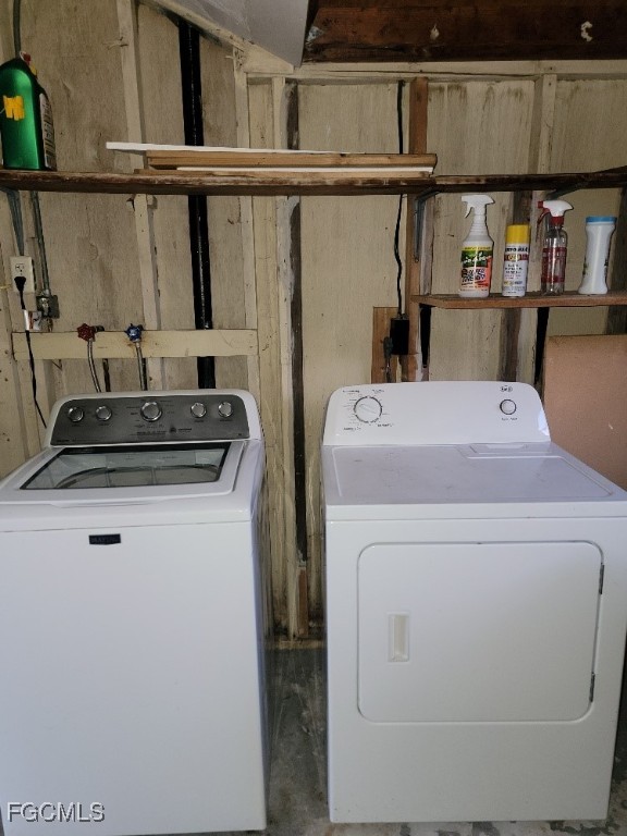341 Richland Road Lehigh Acres, FL 33936 - Photo 16 of 16 a utility room with dryer and washer
