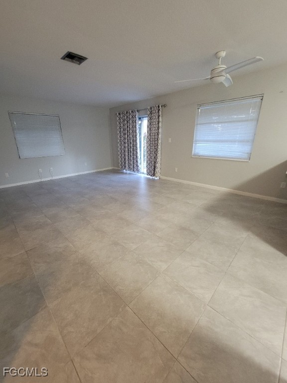 341 Richland Road Lehigh Acres, FL 33936 - Photo 5 of 16 a view of an empty room with a window