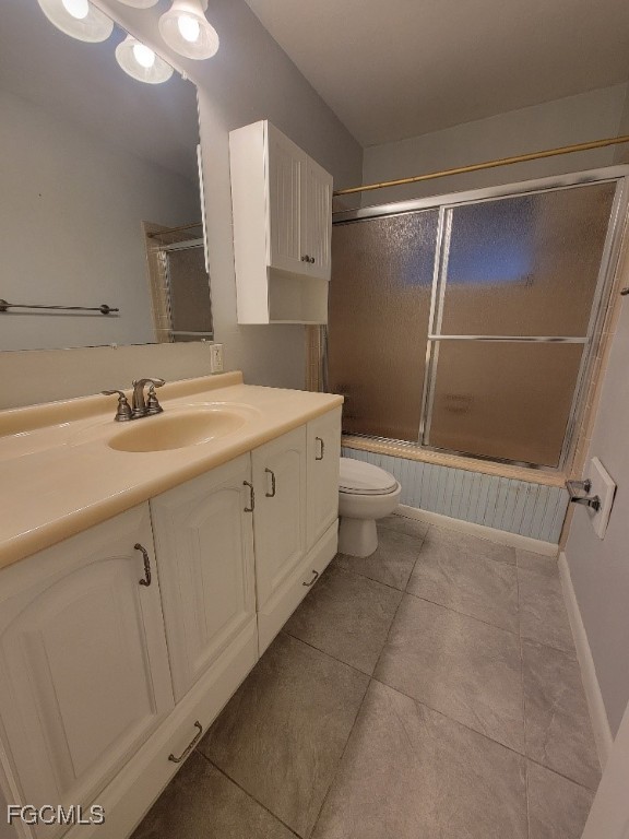 341 Richland Road Lehigh Acres, FL 33936 - Photo 9 of 16 a bathroom with a double vanity sink and mirror