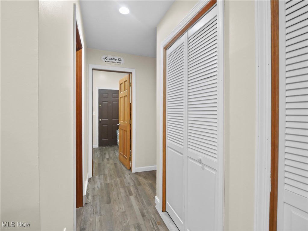 4234 Lyntz Road Warren, OH 44481 - Photo 10 of 36 Hall with light wood-style floors and baseboards