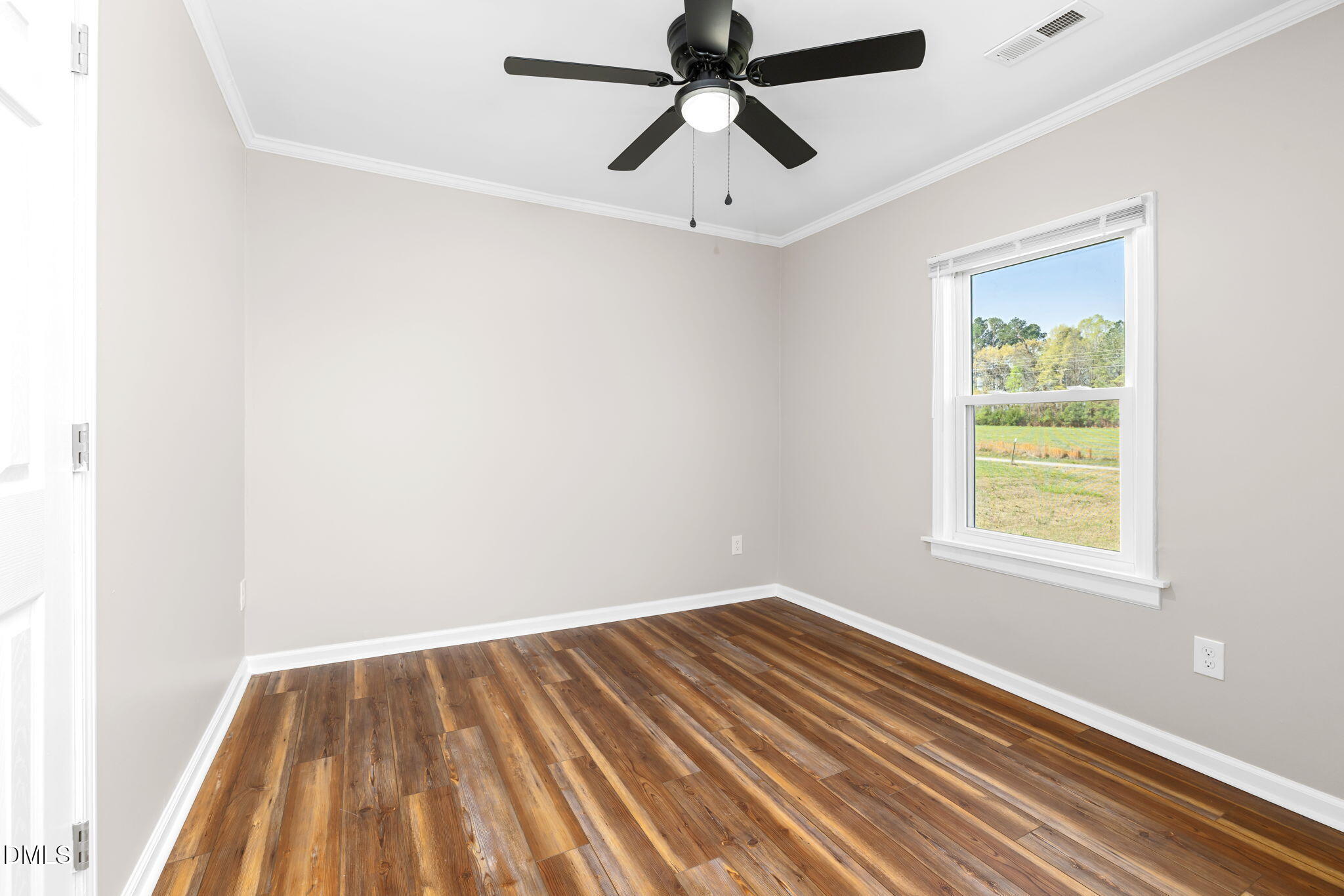 426 Rooker Dairy Road Norlina, NC 27563 - Photo 17 of 33 a view of room with ceiling fan and window