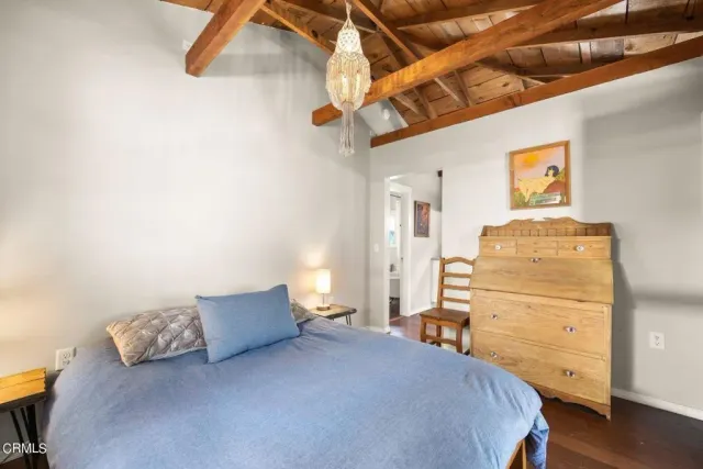 a storage room with a window and furniture