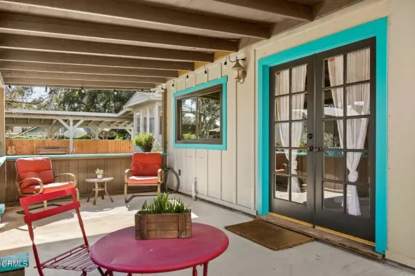 a view of a yard with patio