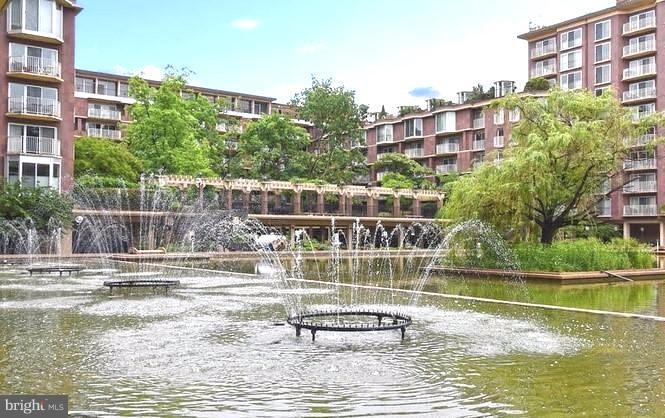 560 N Street Southwest, Unit N107 Washington, DC 20024 - Photo 2 of 10 a view of a swimming pool with a lake view