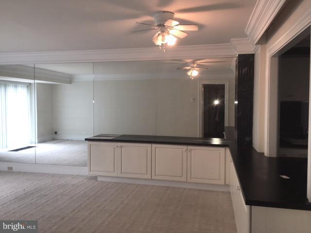 560 N Street Southwest, Unit N107 Washington, DC 20024 - Photo 4 of 10 a view of an empty room with a window