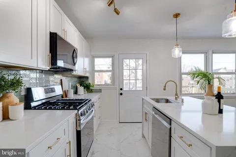 a bedroom with a bed and a wooden floor