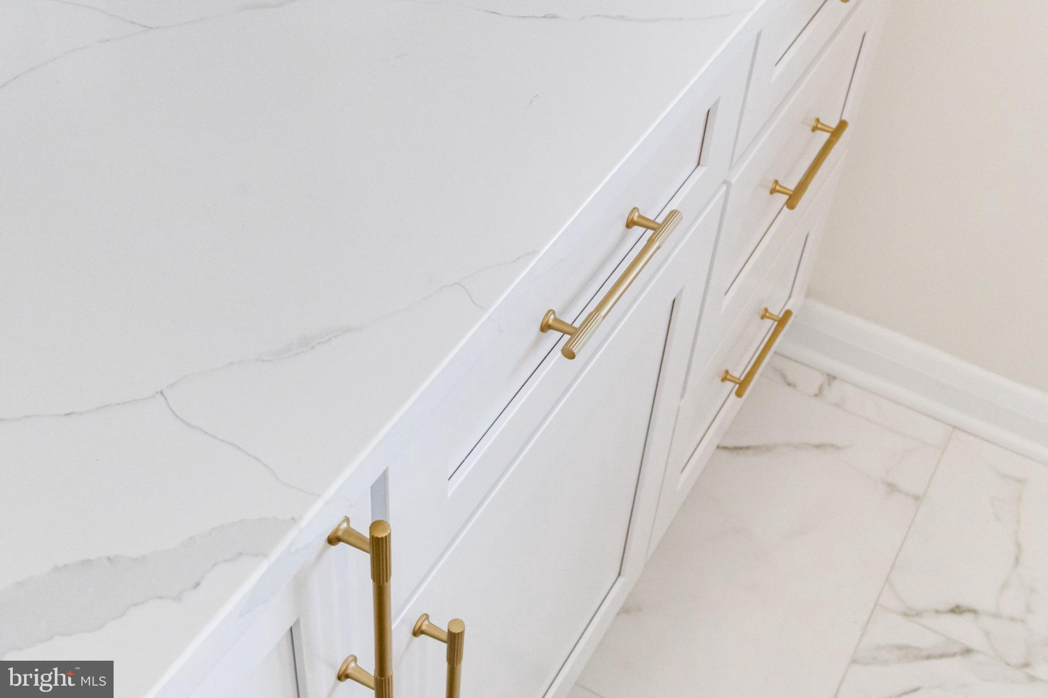 1524 Ramblewood Road Baltimore, MD 21239 - Photo 30 of 83 Custom cabinetry with gold accents.