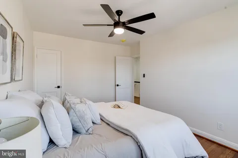 a picture of a bench in front of a door