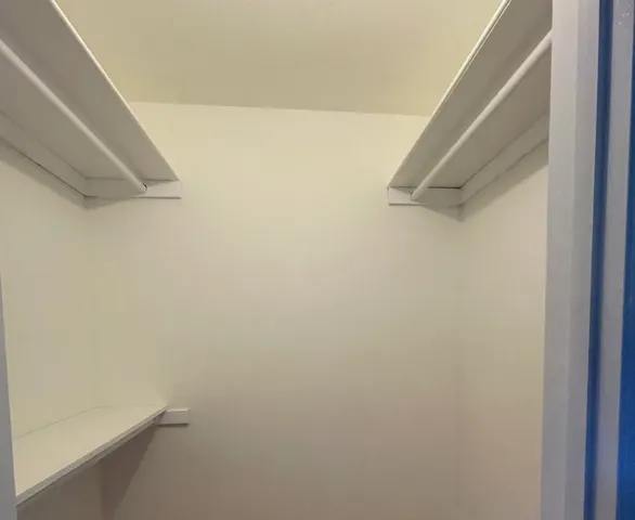 a view of small space with racks on the wall