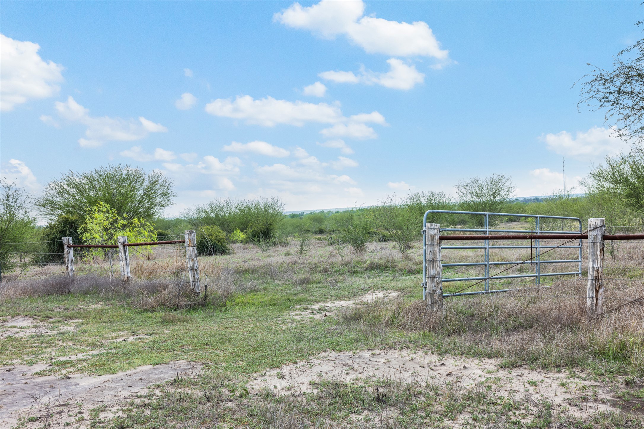 20.02-acres Concrete-Edgar Road Cuero, TX 77954 - Photo 1 of 20 Gate featuring a view of rural / pastoral area