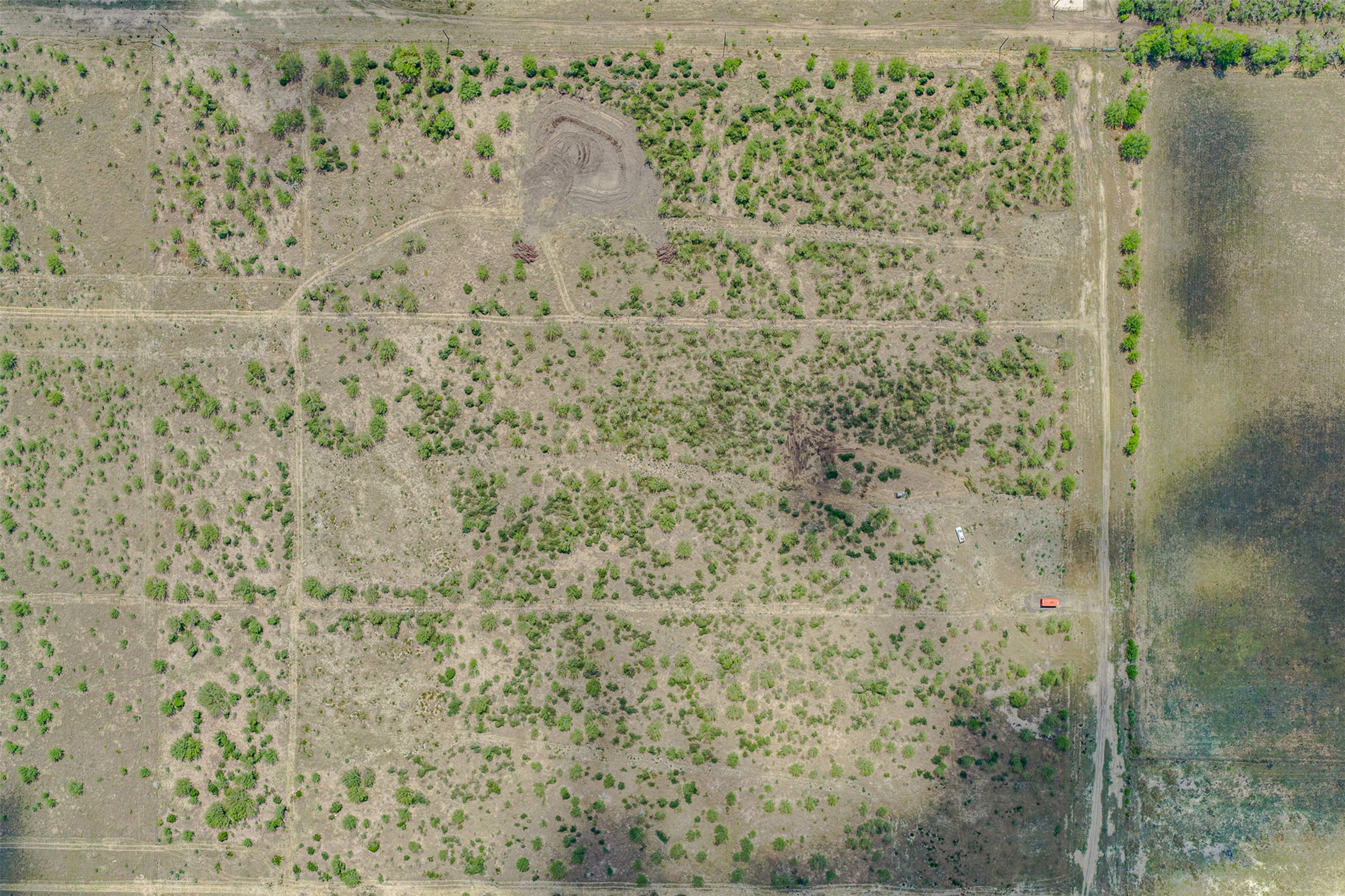 20.02-acres Concrete-Edgar Road Cuero, TX 77954 - Photo 17 of 20 Aerial view of sparsely populated area with a desert landscape