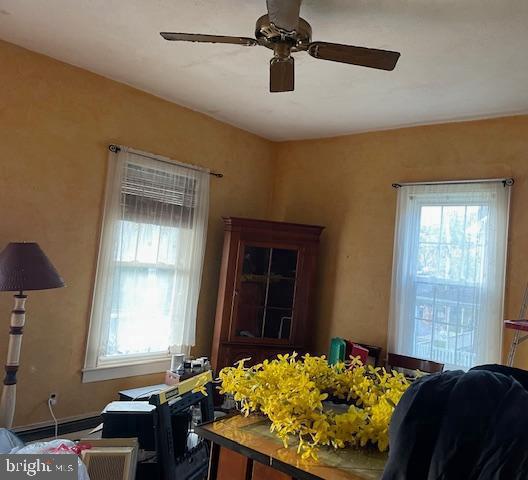 1807 Sutton Avenue Baltimore, MD 21227 - Photo 12 of 26 a bed room with a bed and a window