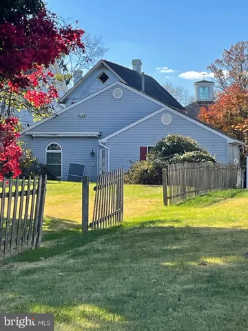 a view of a house with a swimming pool