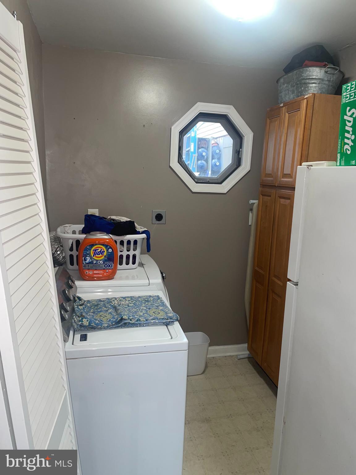 1807 Sutton Avenue Baltimore, MD 21227 - Photo 22 of 26 a utility room with dryer and washer