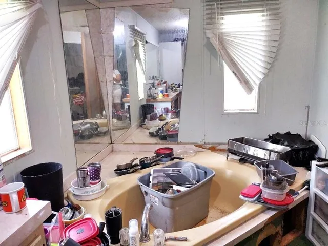 a room with a window and couch