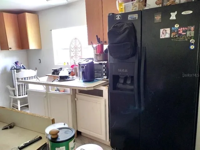 a kitchen with a sink and a stove