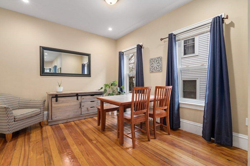 9 Baker Road Everett, MA 02149 - Photo 5 of 14 a dining room with furniture and wooden floor