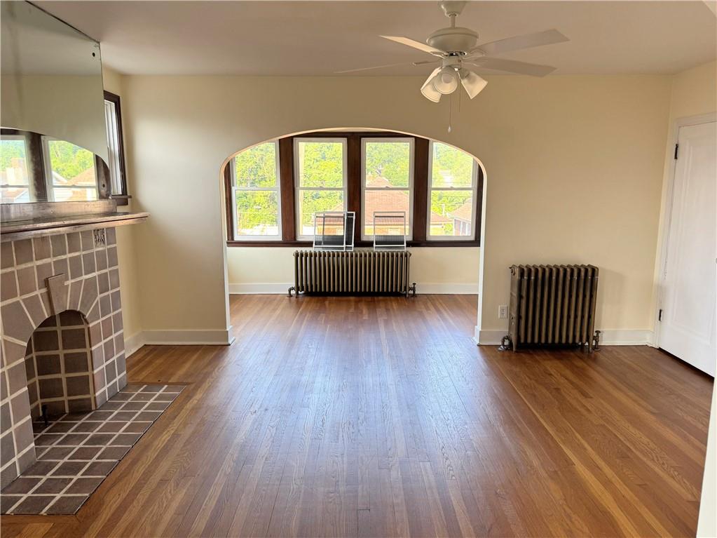538 Halsey Avenue, Unit 2 Pittsburgh, PA 15221 - Photo 5 of 6 wooden floor in an empty room with a window