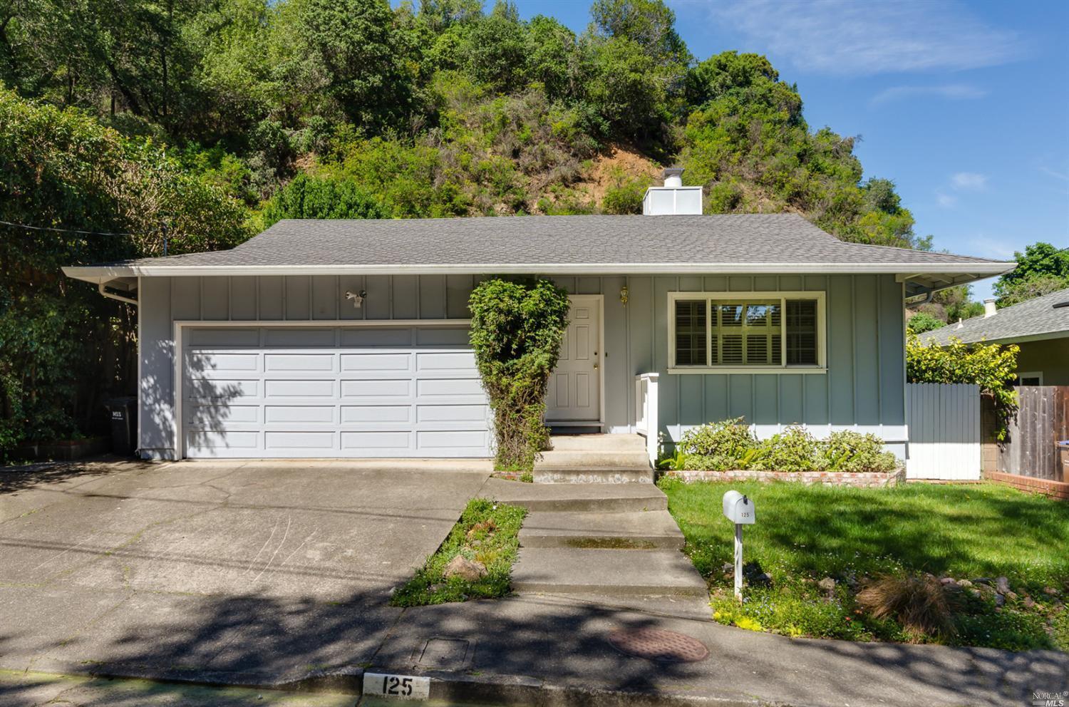 125 Irwin Street San Rafael, CA 94901 - Photo 1 of 1 a front view of a house with garden