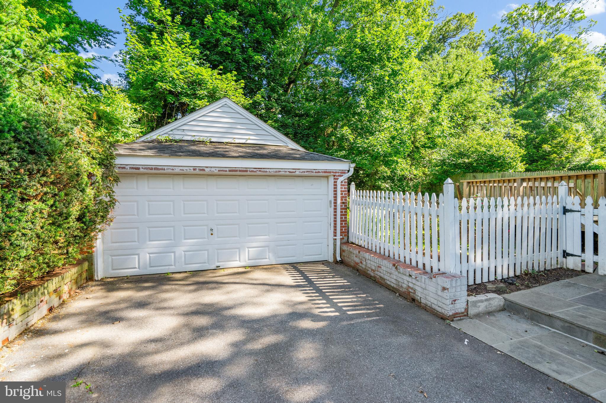 736 Dennis Avenue Silver Spring, MD 20901 - Photo 26 of 34 Two-car garage with driveway parking for 4 cars