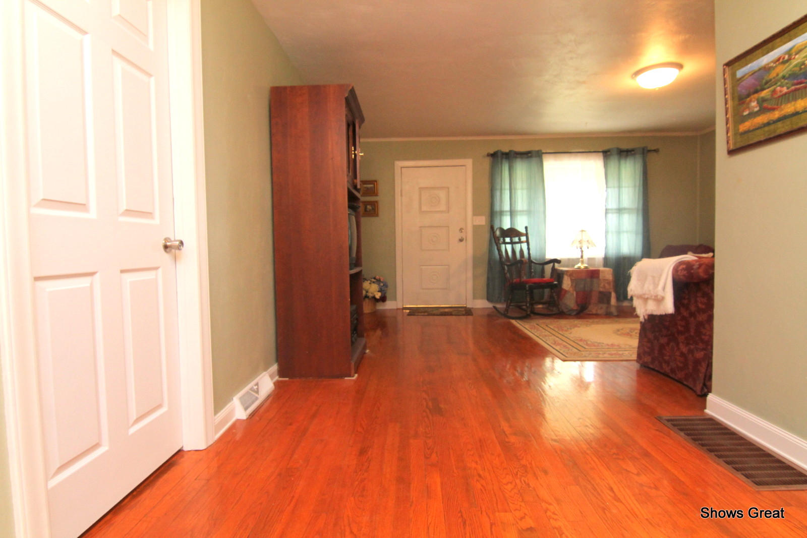 1641 Morgans Mill Road Goodview, VA 24095 - Photo 7 of 50 a view of a bedroom with furniture and wooden floor