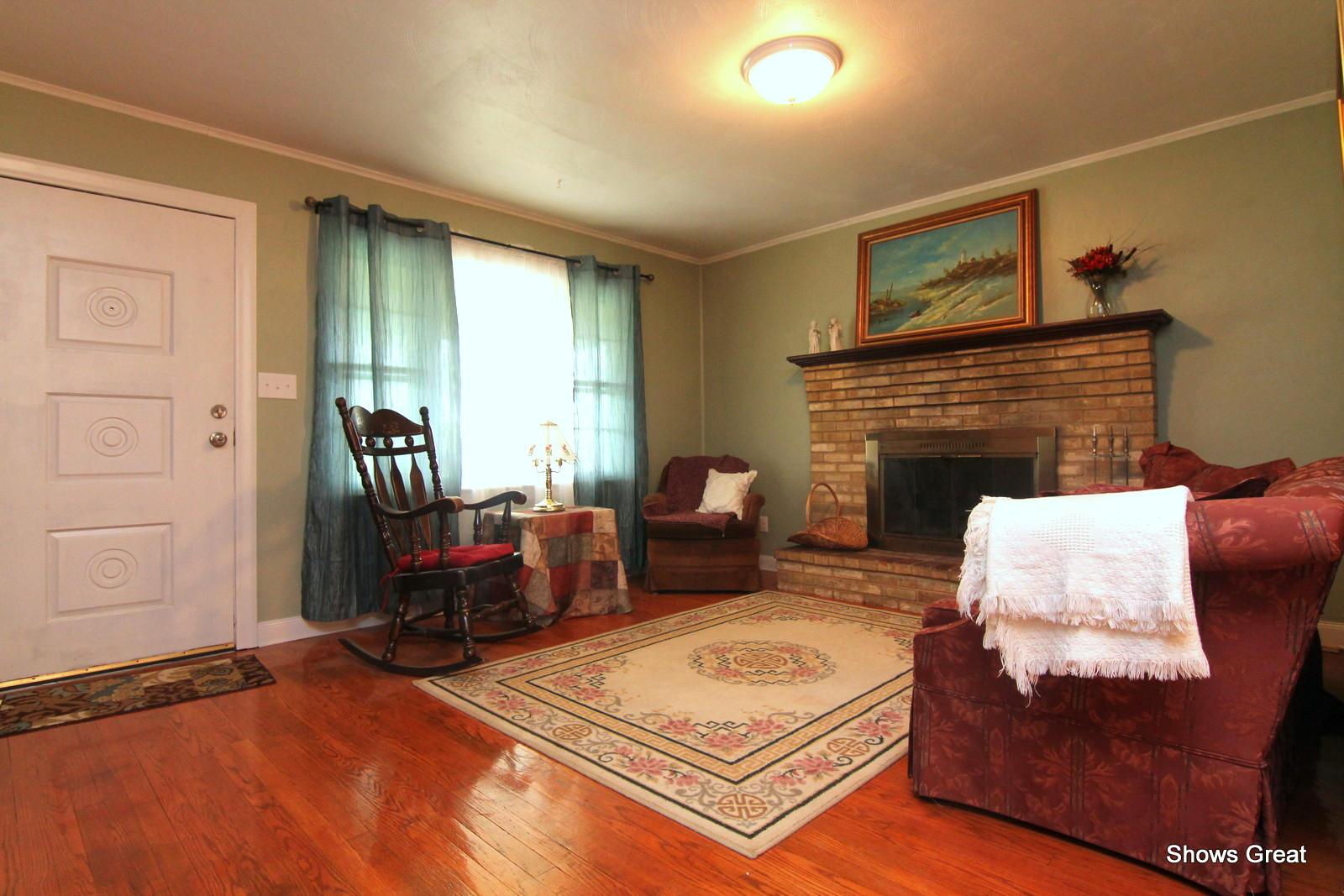 1641 Morgans Mill Road Goodview, VA 24095 - Photo 8 of 50 a living room with furniture rug and wooden floor