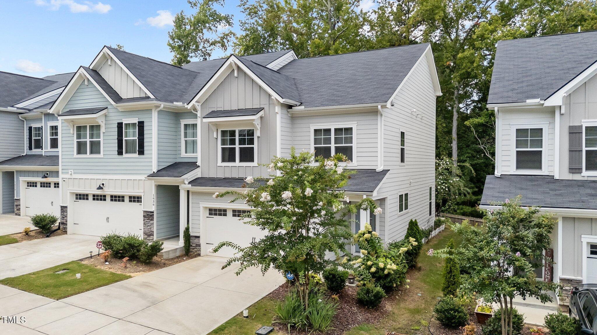 1634 Brussels Drive Apex, NC 27502 - Photo 2 of 32 5-web-or-mls-DJI_20240815131528_0117_D