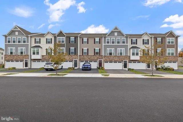 a front view of a building with street view