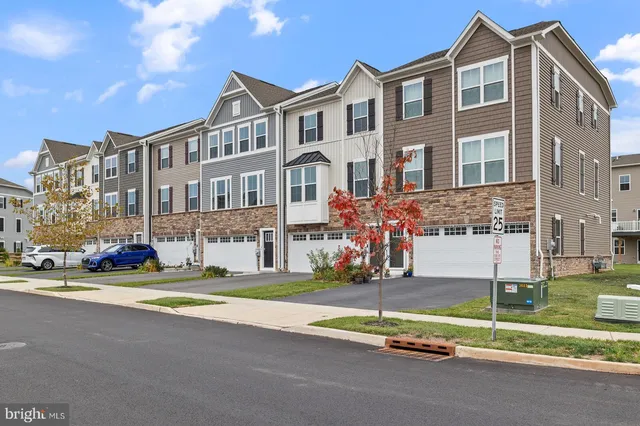a front view of a building with street view