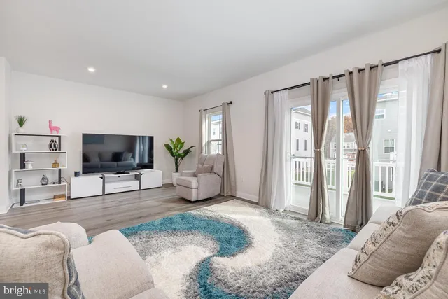 a view of a balcony with wooden floor