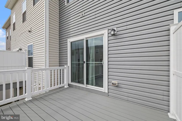 a bathroom with a sink a mirror and a toilet