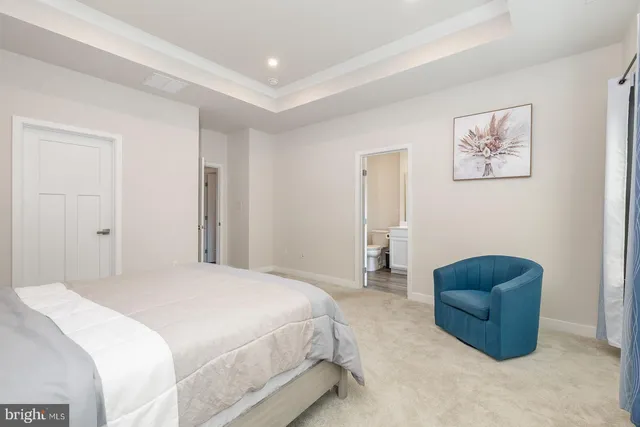 a bathroom with a double vanity sink toilet and shower