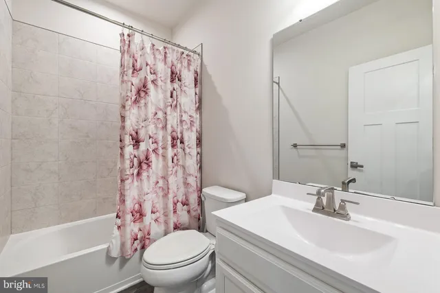 a front view of building with yard