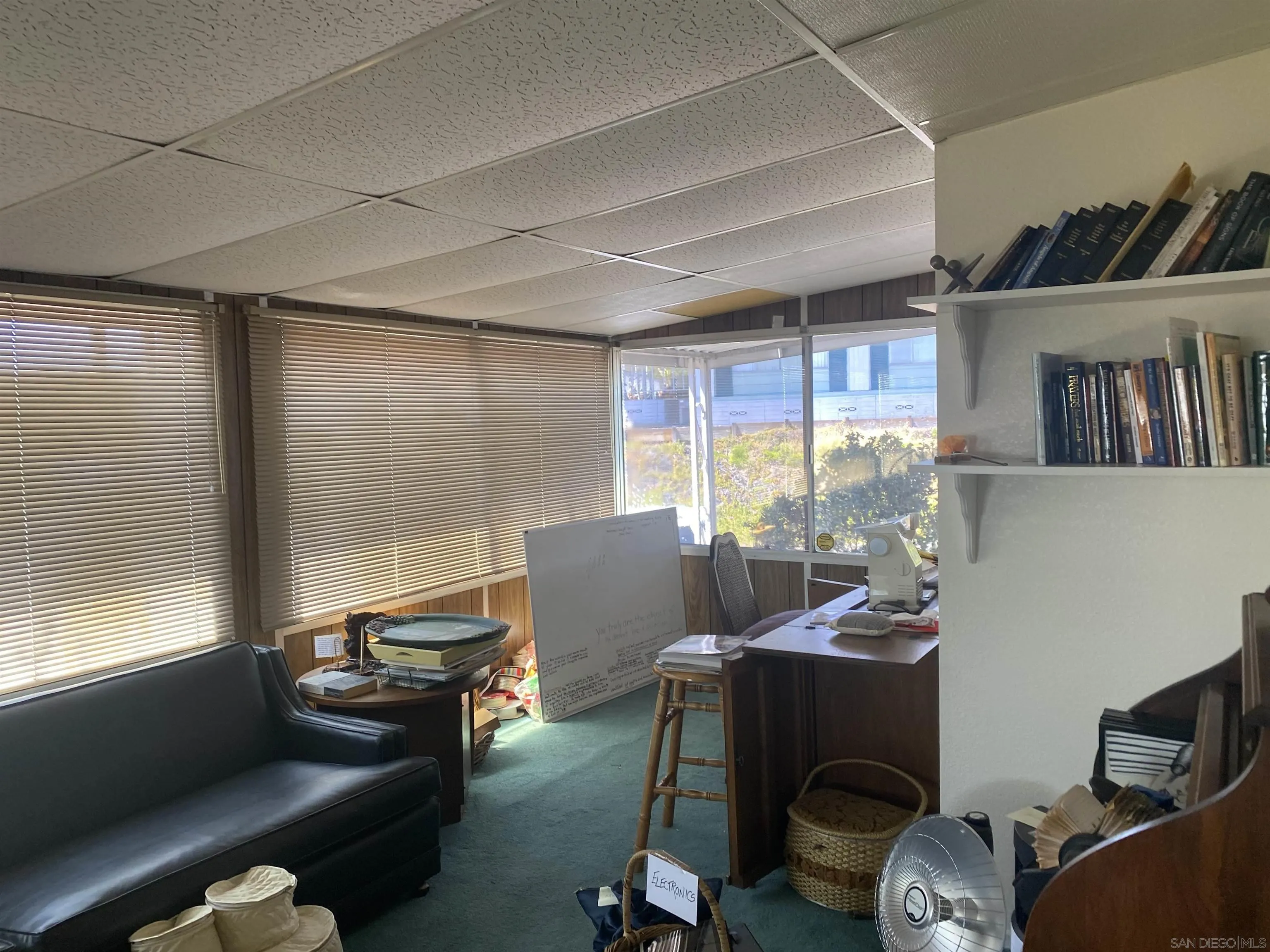 1925 Otay Lakes Road, Unit 88 Chula Vista, CA 91913 - Photo 11 of 15 a living room with furniture and a window