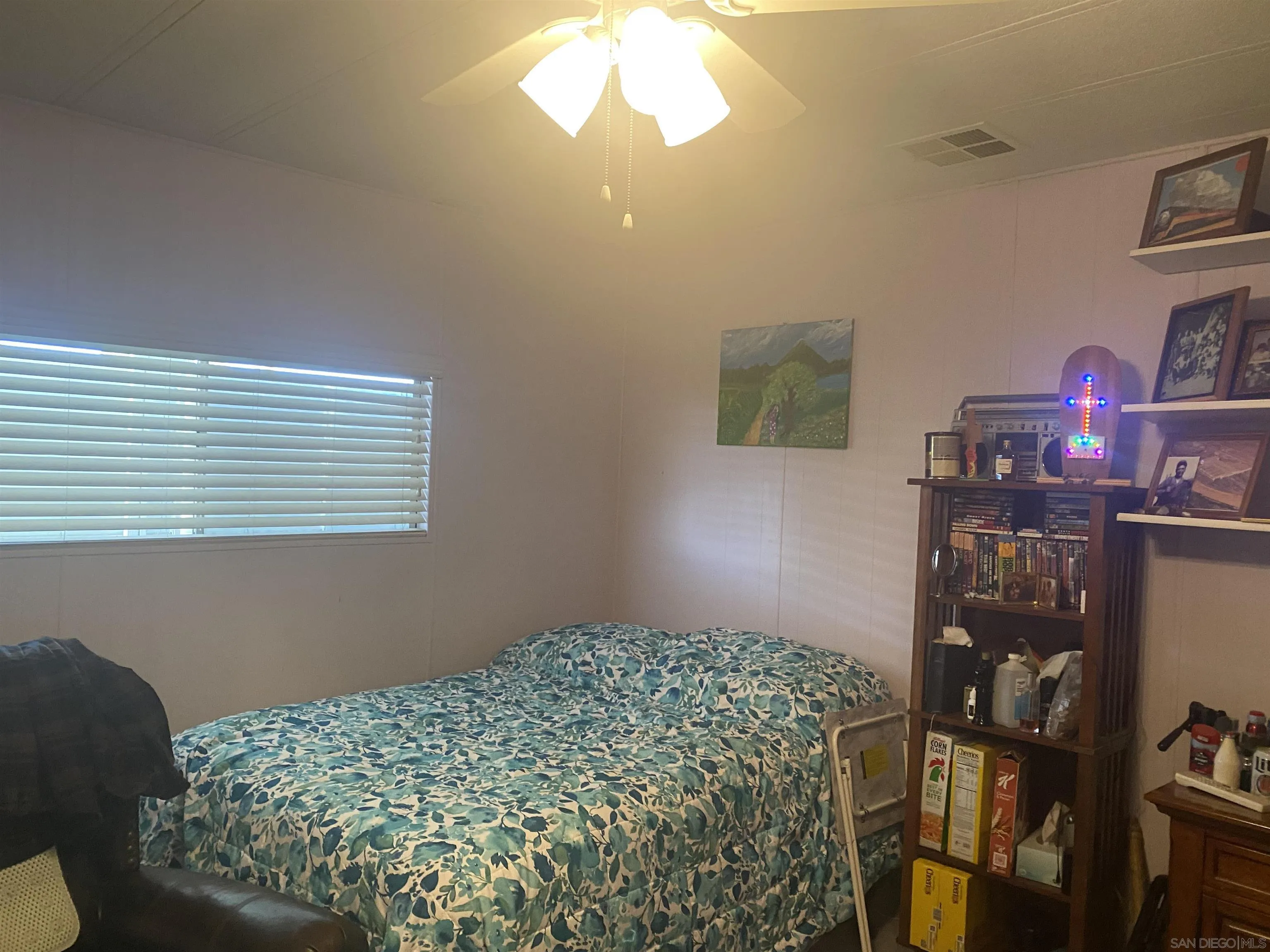 1925 Otay Lakes Road, Unit 88 Chula Vista, CA 91913 - Photo 12 of 15 a bedroom with a bed and a window