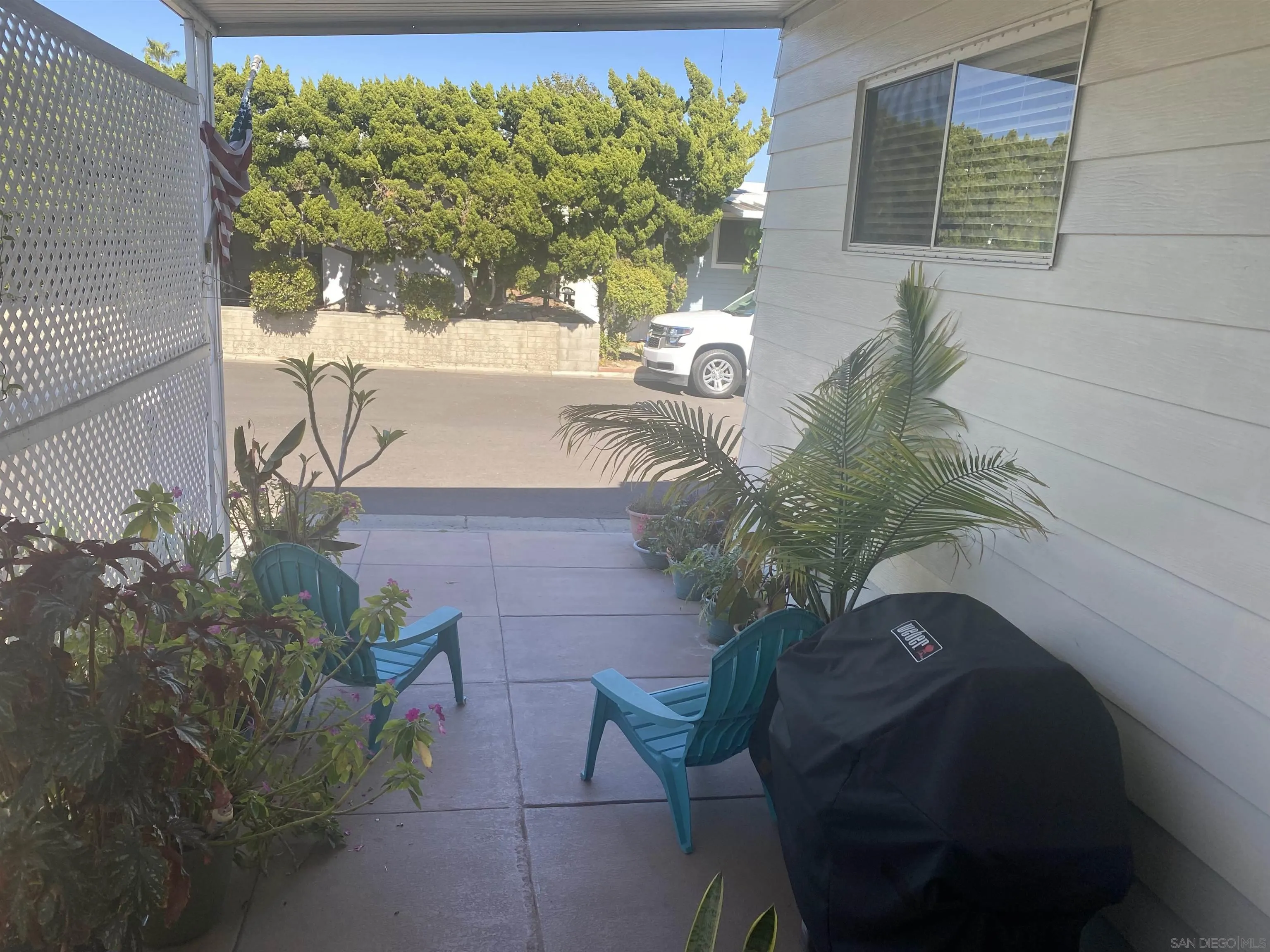 1925 Otay Lakes Road, Unit 88 Chula Vista, CA 91913 - Photo 2 of 15 a vase of flowers sitting on a floor