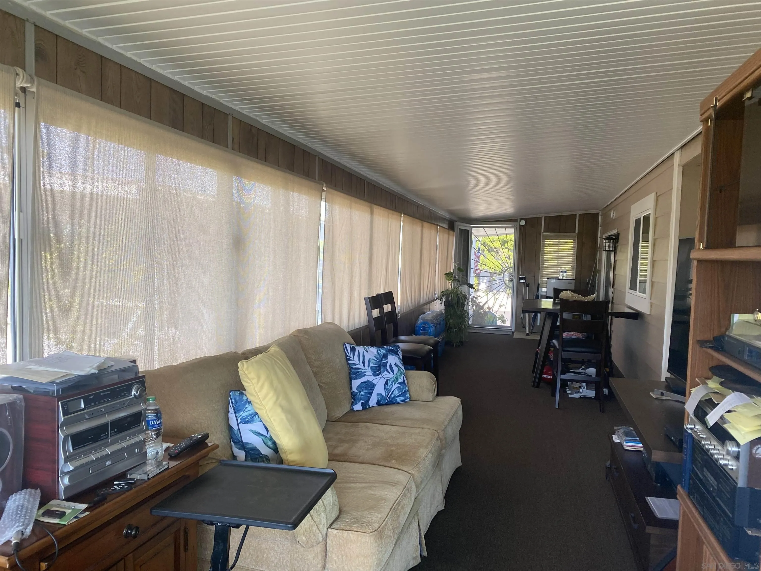 1925 Otay Lakes Road, Unit 88 Chula Vista, CA 91913 - Photo 10 of 15 a living room with furniture and a window