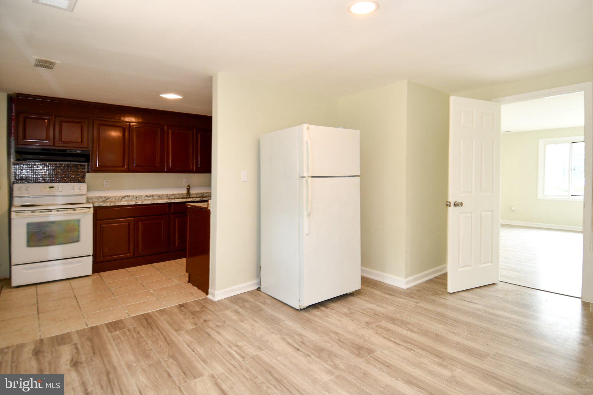 7768 Burnside Road Landover, MD 20785 - Photo 13 of 27 Modern kitchen with inviting space.
